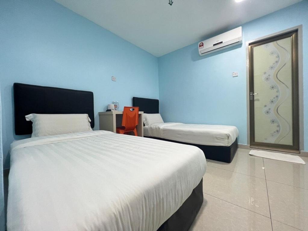 Twin Room at Point Stay Stutong